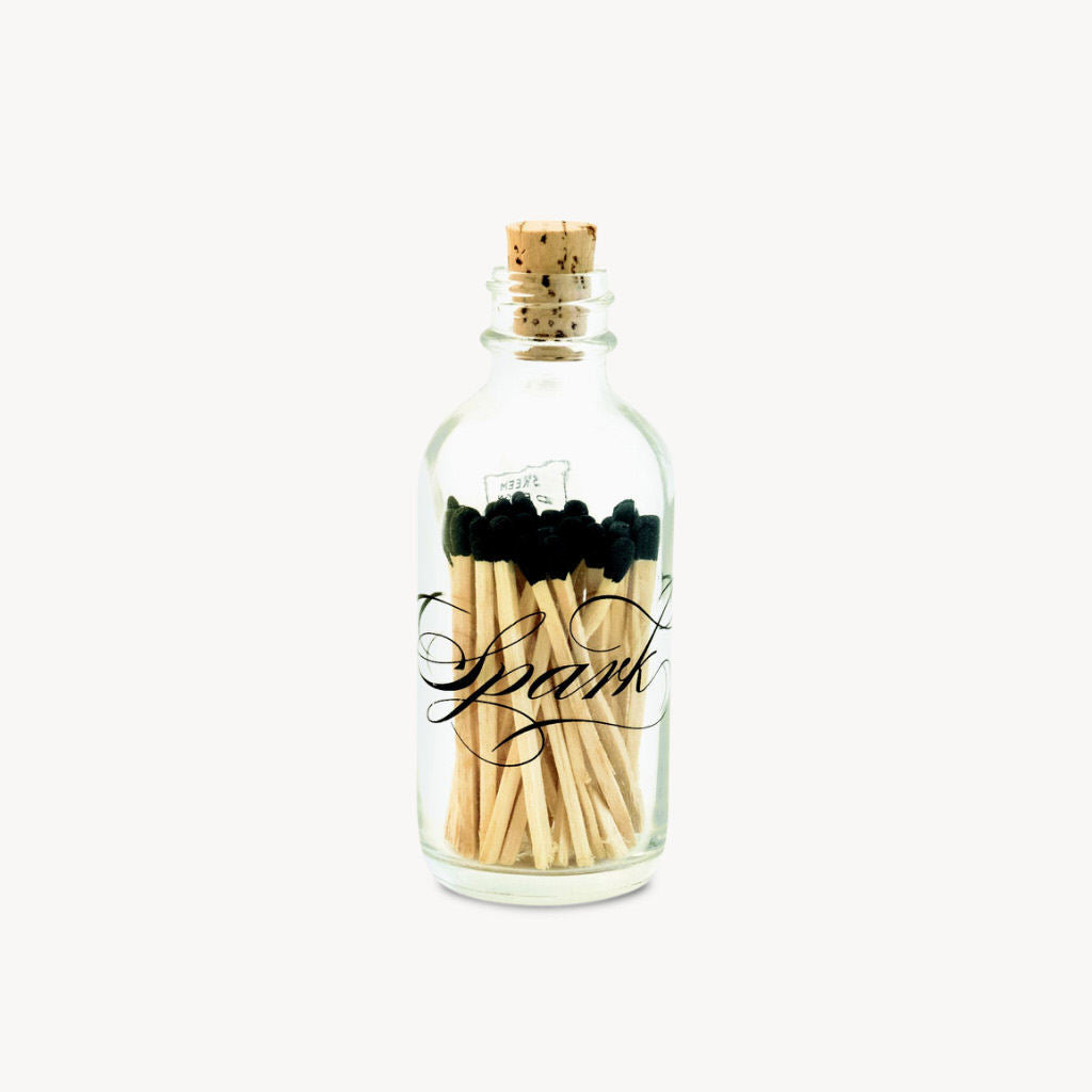 Our new apothecary match bottles are an updated option to our classic style. The Mini Calligraphy bottle is silk-screened with the word "spark" in a beautifully ornate design. The bottles feature our exclusive strike-on-bottle design and have a striker strip on the back of the bottle for lighting all your matches in style.